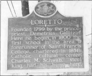 Historical marker commemorating the founding of the city of Loretto by the prince-priest Demetrius Gallitzin. Charles M. Schwab was a local steel magnate who built the St. Michael's Basilica in 1899. 