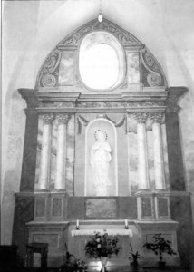The statue of the Immaculate Conception stands in one of the church’s chapels. 