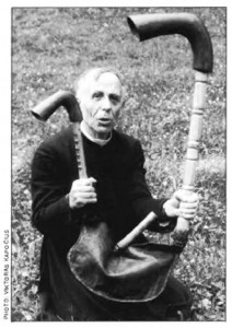 The pastor of Labanoras holds a bagpipe-like instrument called dūdmaišis or Labanoro dūda known since the 16th century or earlier.