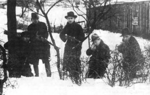 Armed volunteers gather on the outskirts of Klaipėda prior to their assault.