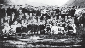 Lithuanian miners of Lanarkshire, Scotland and their families enjoy a picnic among the coal bings (culms) during the early part of the last century