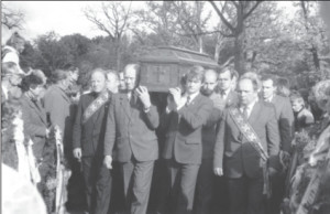 The casket with the remains of Rimantas Stankevičius is being carried to its final resting place at the Aukštųjų Šančių Military Cemetery in Kaunas. The pallbearer on the right of the casket is current Lithuanian President Rolandas Paksas, a flyer himself.