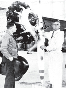 Girėnas (left) and Darius mount a new propeller on the “Lituanica.” 