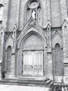The entrance to Žeimiai’s church.