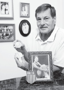 David Van Aken proudly displays his mother’s Olympic gold medals and other memorabilia.