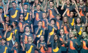 The children’s chorus took an active part in the Festival. Dressed in tee-shirts with the mascots of the Festival–orange and yellow birds nicknamed Melody and Rhythm–the children let their voices be heard (Photo by J. Kuprys)
