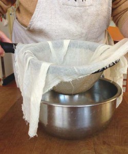 No fancy equipment needed—just quality cheesecloth, a nice rounded sieve and a pan to set it in.