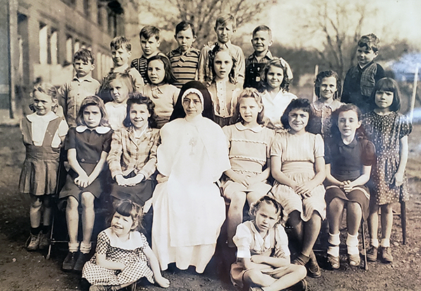 A photograph discovered while doing research on Holy Rosary Catholic Church School in Hartshorne, Oklahoma. There are several Lithuanian children in the picture.